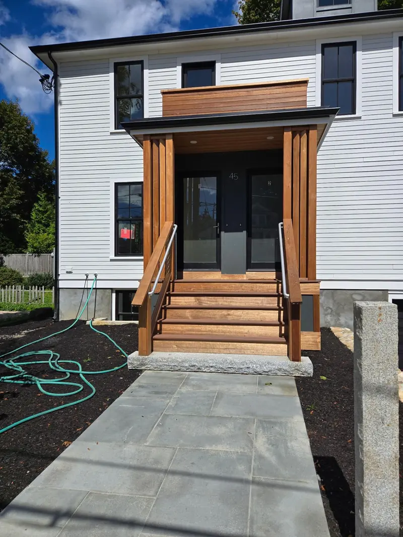 New front entry portico with wood columns — R&L project